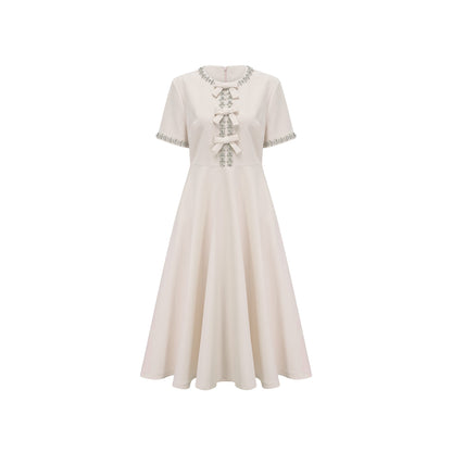 Cassiopeia crystal-accented bow midi dress in White
