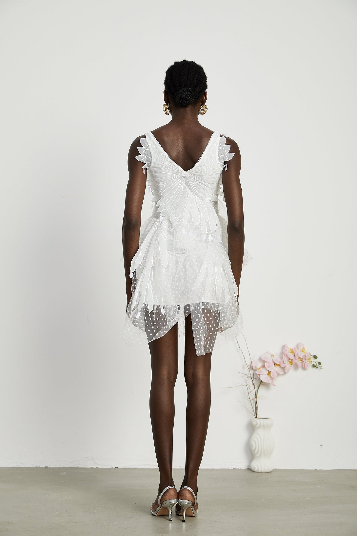 Françoise feather-embellished pleated mini dress