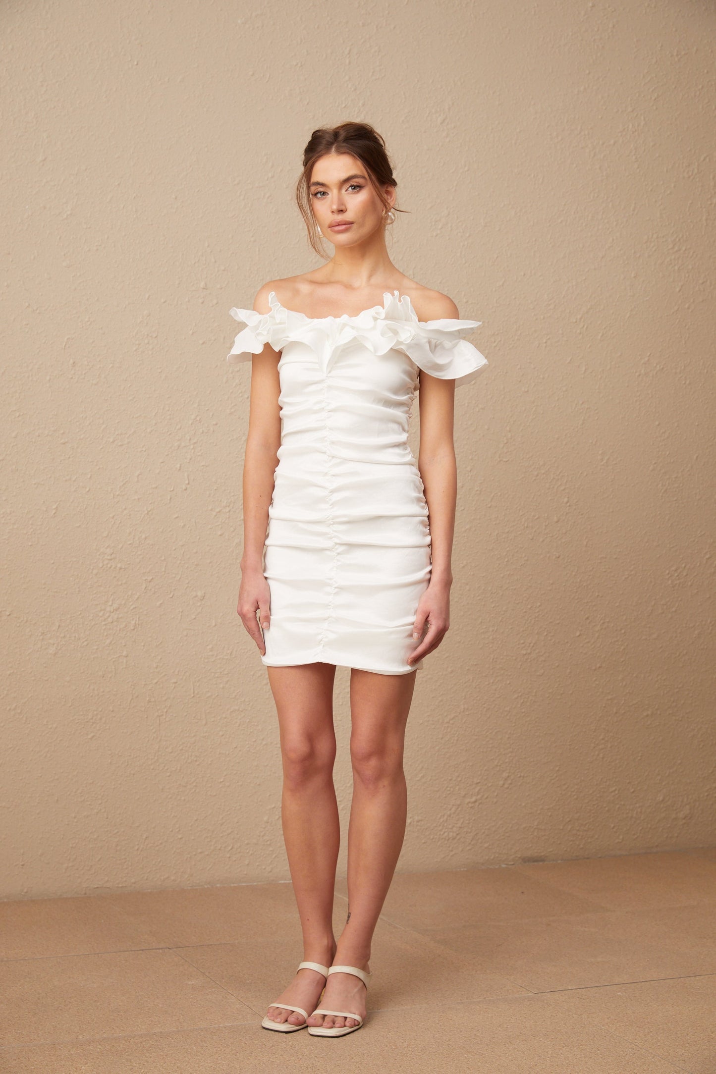Aïssatou white off-shoulder ruffled mini dress